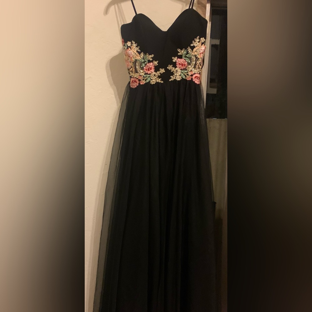 Never been used black strapless prom/homecoming dress By Blondie Nites Size 1
